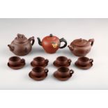 Chinese Yxing clay tea ware, including six tea cups and six saucers and three assorted clay tea