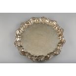 Silver salver, piecrust scrolling edge, foliate engraved with inscription, assay marked Chester 1910