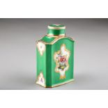 Continental ceramic tea caddy with cover, apple green ground with a hand painted fancy bird, gilt