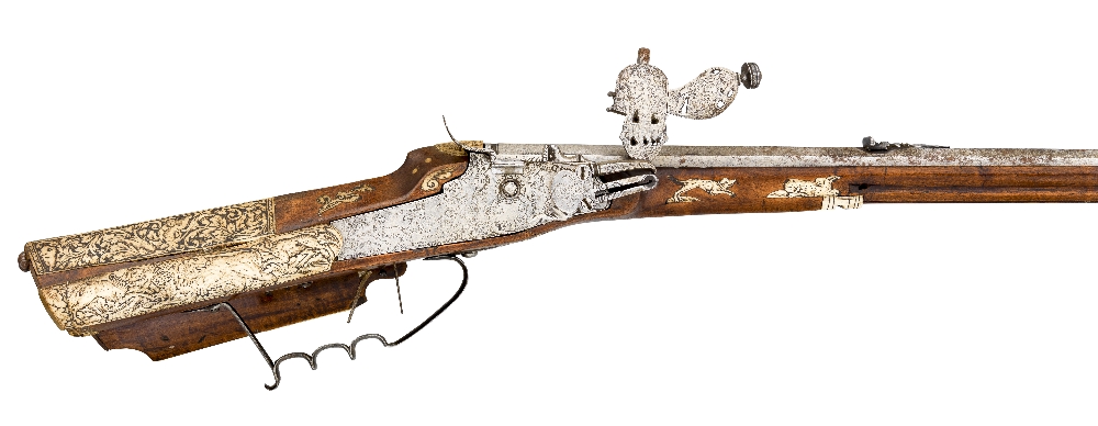 A .54 BORE GERMAN WHEEL-LOCK SPORTING RIFLE, CIRCA 1660 AND LATER with octagonal swamped sighted