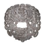 A HIGHLY DECORATED CHISELLED IRON DISH-GUARD FROM A SWORD, PROBABLY FRENCH THIRD QUARTER OF THE 17TH