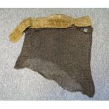 A SKIRT OF MAIL, 19TH CENTURY BUT PROBABLY CUT FROM AN EARLIER MAIL SHIRT OF EASTERN ORIGIN formed