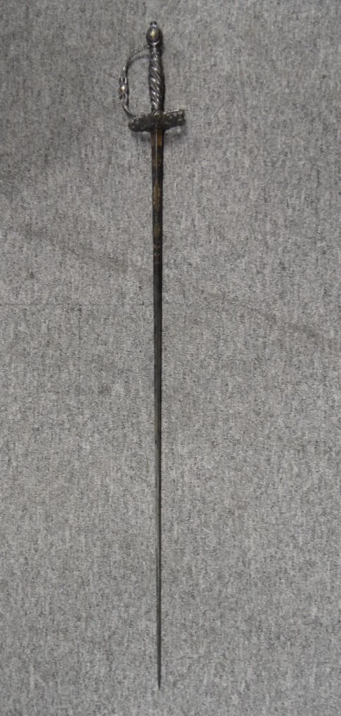 ‡A SMALL-SWORD WITH CUT-STEEL HILT, CIRCA 1790 with hollow-triangular blade etched and gilt with