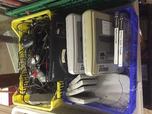 Two crates of Super Nintendo with games,