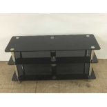 Black glass three tier tv stand