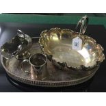A silver plated christening cup, together with three other items of silver plate.