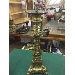 A brass embossed table lamp base