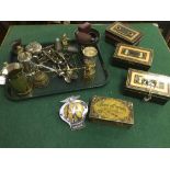 A tray of pewter salt and pepper pots, money boxes, AA badge, bottle openers, trinket box,