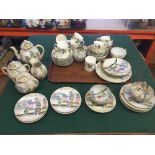 A Wedgwood Beaconsfield coffee set and an oriental teaset