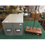 A set of weighting scales and a two drawer metal index chest