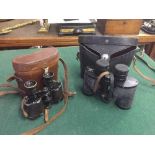 A pair of binoculars by R.