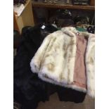 Two simulated fur coats