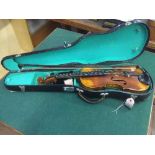 A violin and bow in hard carry case