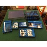 Nine boxes containing various stainless steel cutlery by Viners of Sheffield (9)