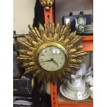 Gilt sunburst wall clock