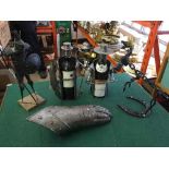 Two metal sculptures/wine bottle holders,