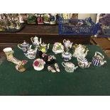 A tray of collection of miniature teapots and china posies