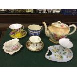 A tray of antique teapot, Leonardo Collection cups & saucers, Royal Albert cup & saucer,