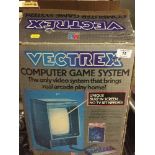 An early 1980's MB Vectrex computer games system and games, boxed.