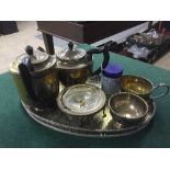 A four piece silver plated tea service on gallery tray