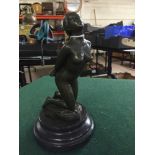 Bronze figure on stone base : Nude female with arms behind her back.