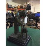 Bronze figure on stone base : erotic study with lady at water well.