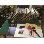 A box of LP records - Queen, The Police,