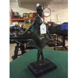 Bronze figure on stone base : Art Deco dancer in flared dress.