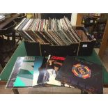 A box of LP records - Queen, ELO,