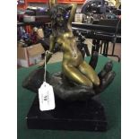 Bronze figure on stone base : nude female on palm of hand.