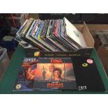 A box of LP records music compilations and film soundtracks including Fame, Mad Max,