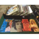 A box of LP records including Alice Cooper, Leo Sayer,