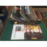 A box of LP records including Status Quo,