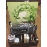 Five Marilyn Monroe wall canvas and a box of framed pictures, money boxes, books,