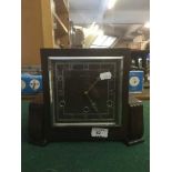 An oak cased Art Deco style mantel clock