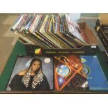 A box of 12" records - Motown and disco