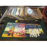 A box of LP records including The Doors, The Beach Boys,