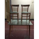 A melamine table and two chairs