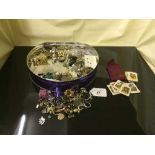 A collection of earrings and other small items of costume jewellery.