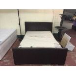 A brown leather Barker & Stonehouse 4'6 bed frame with mattress