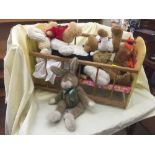 A box of quantity of classic headed dolls, wooden crib,