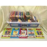 A box of boxed Noddy vehicles and books