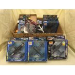 A box of assorted die cast cars and planes,