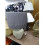 Two con temporary metal table lamps with shades together with one other