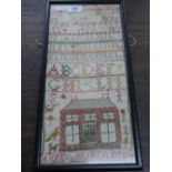 A Victorian framed sampler