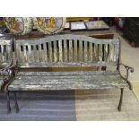 A wood and cast iron garden bench