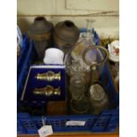 A tray containing brass vases, ship in bottle, Caithness vase, cruet sets,