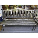 A wood and cast iron garden bench