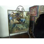 An early 20th century brass framed firescreen