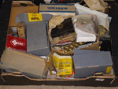 Box containing Yale and Weiser door locks,